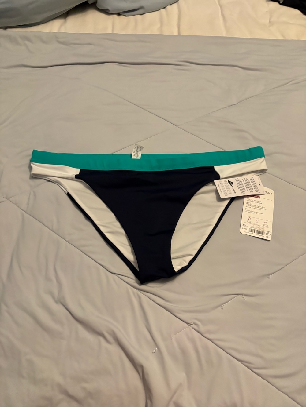 Athleta freestyle Navy Bikini Bottom with Teal and White Trim